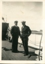 Image of 2 men aboard Thebaud